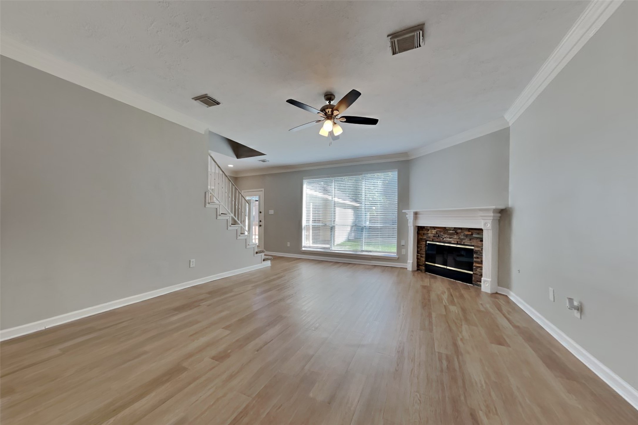 30110 Granum Drive Spring, TX 77386 - Photo 2 of 22 a view of an empty room with a fireplace and a window