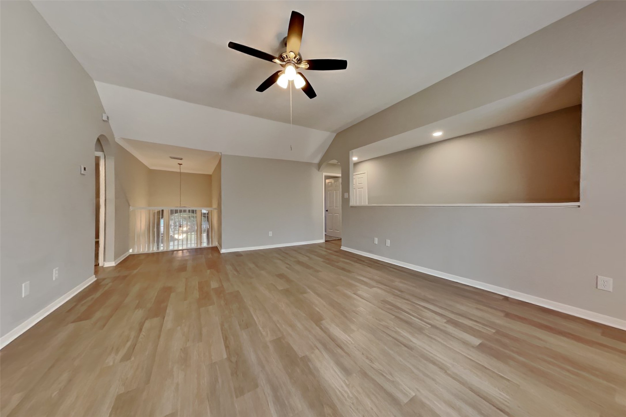 30110 Granum Drive Spring, TX 77386 - Photo 5 of 22 a view of empty room with wooden floor and ceiling fan