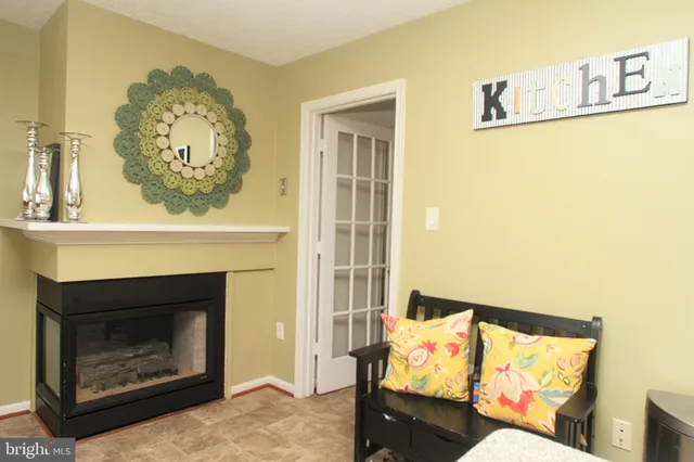 a living room with a fireplace