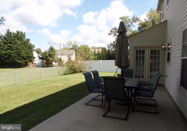 a view of a chairs and table on the terrace