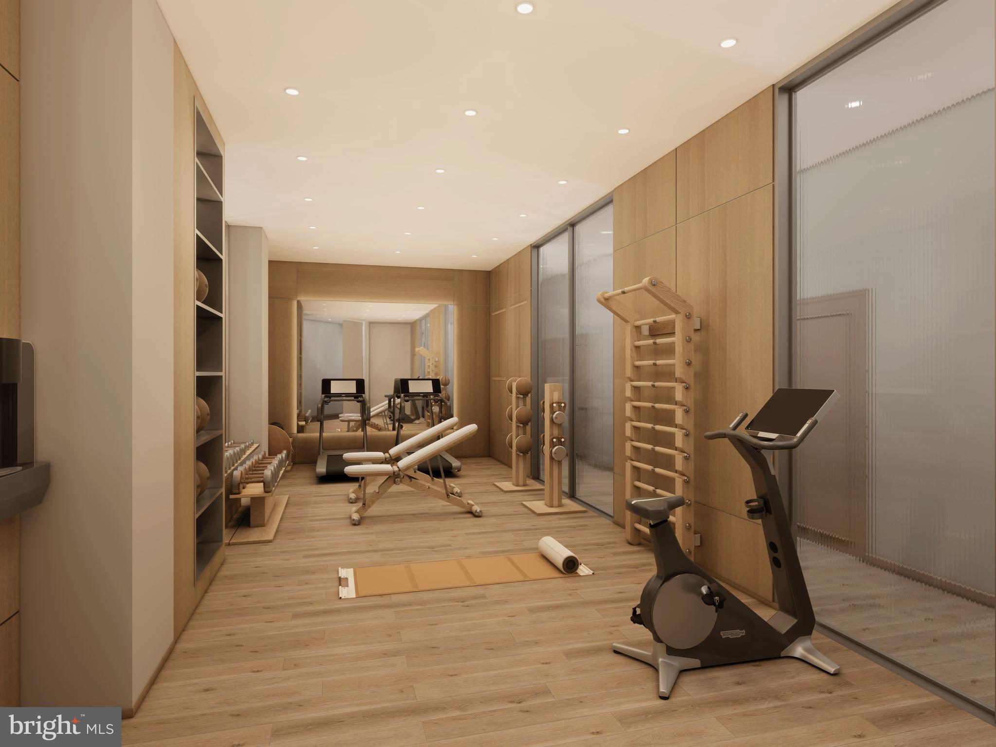 2121 Ward Place Northwest, Unit 304 Washington, DC 20037 - Photo 15 of 20 a view of a room with gym equipment