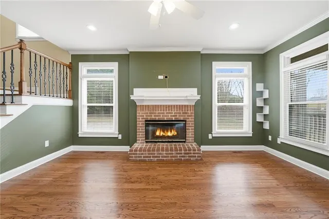 a room that has a chair and a window in it