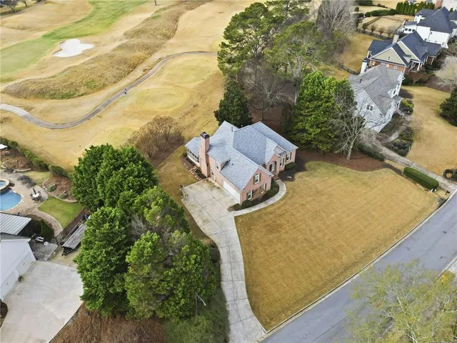 an aerial view of residential house with outdoor space