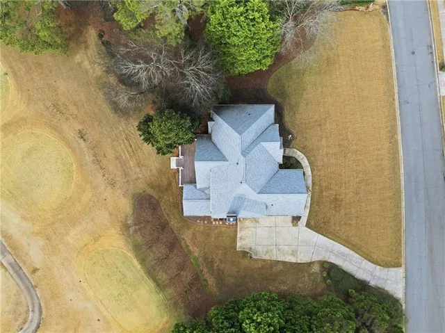 an aerial view of residential house with outdoor space