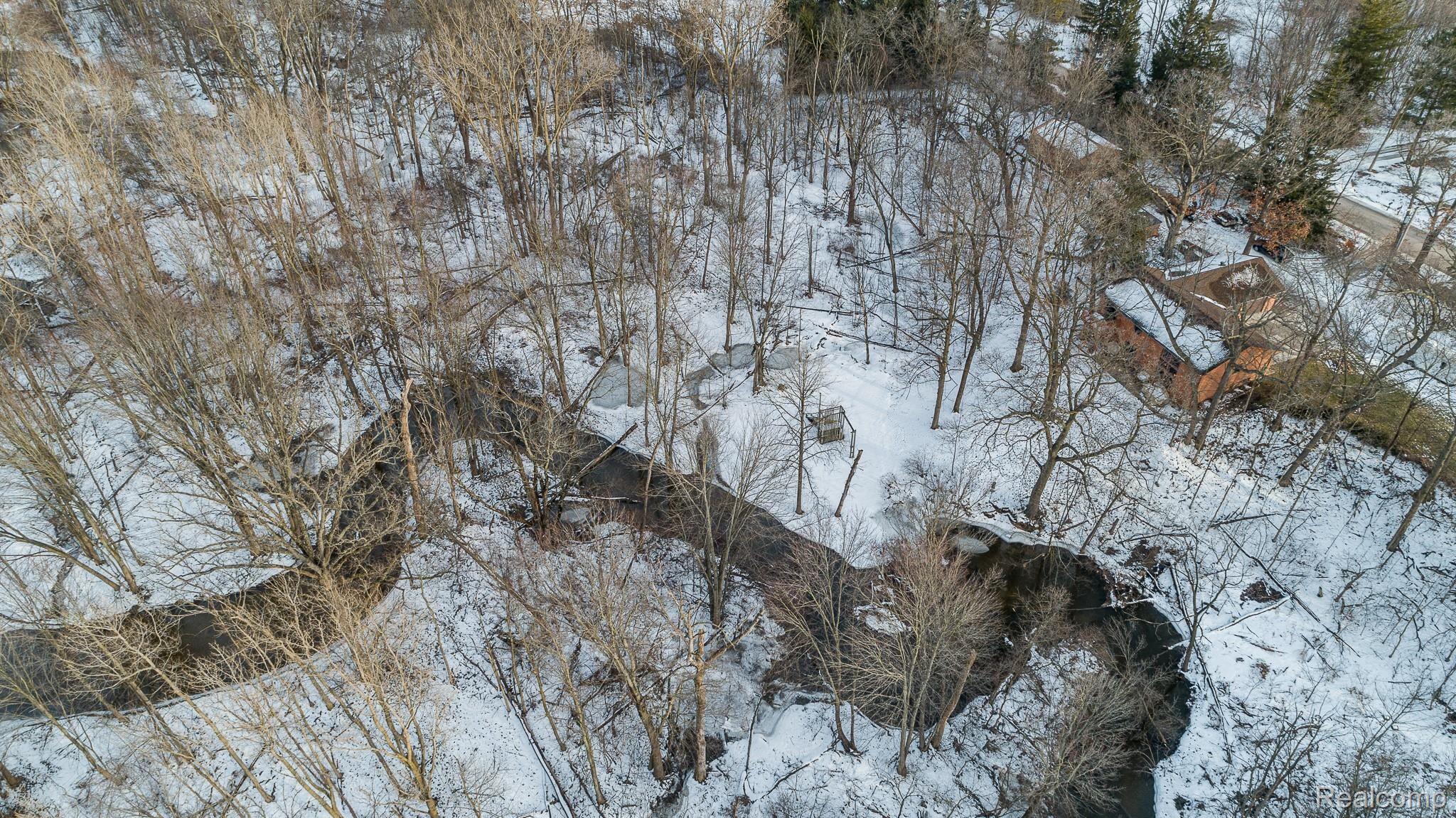 2106 West Cook Road Grand Blanc, MI 48439 - Photo 9 of 65 Backyard View Drone Shot 1.jpg