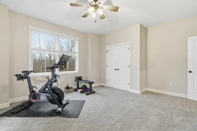 a view of a swimming pool and lounge chairs