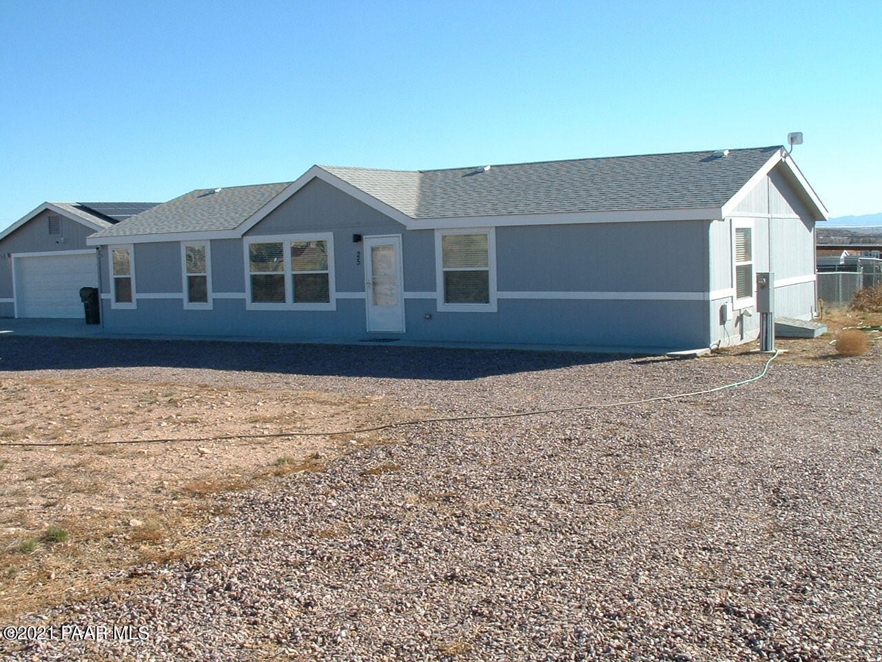 25 West Antelope Run Road Paulden, AZ 86334 - Photo 3 of 27 a front view of a house with a yard
