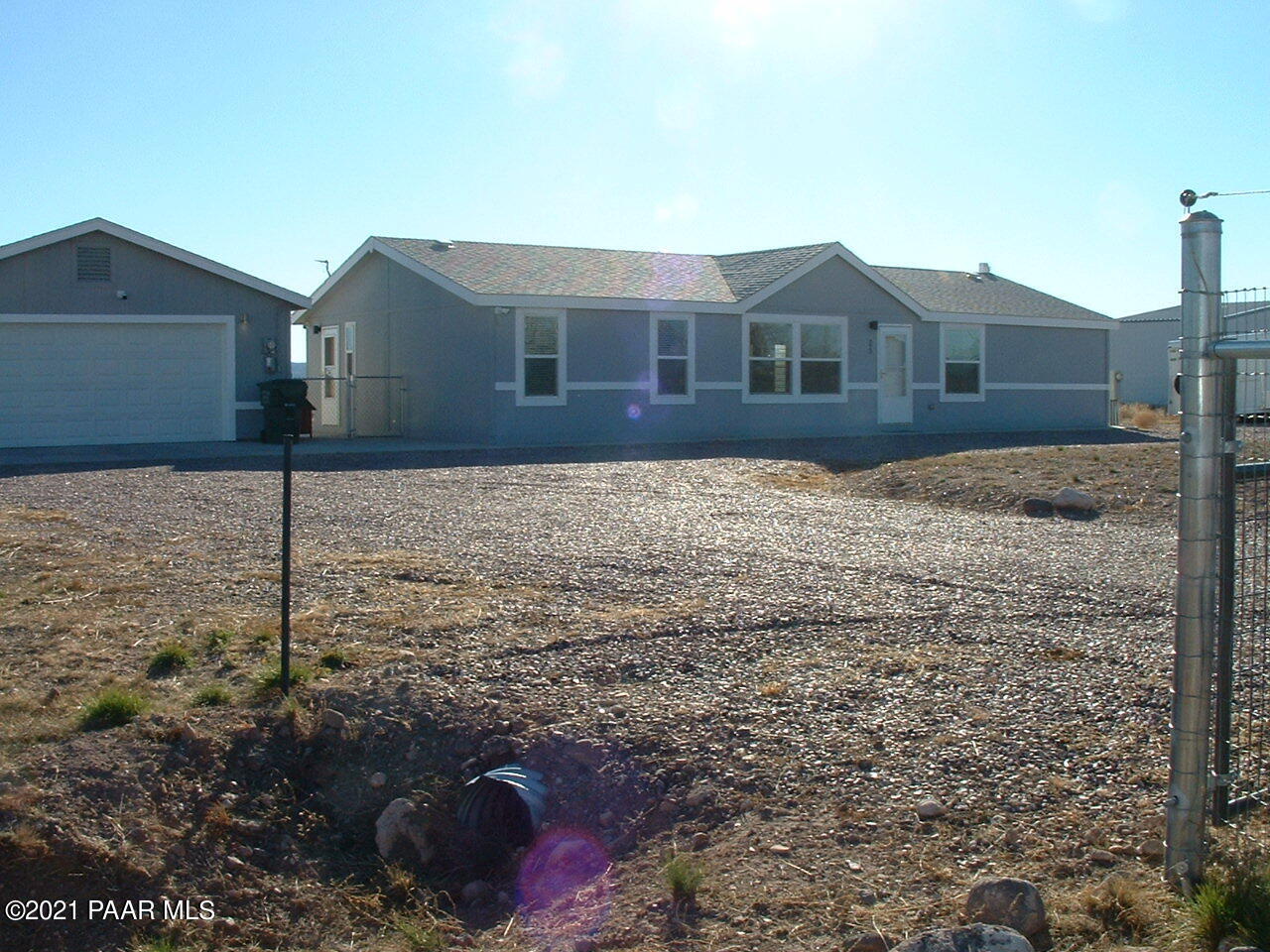 25 West Antelope Run Road Paulden, AZ 86334 - Photo 4 of 27 a front view of a house with a yard