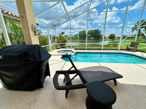a view of yard with patio and outdoor seating