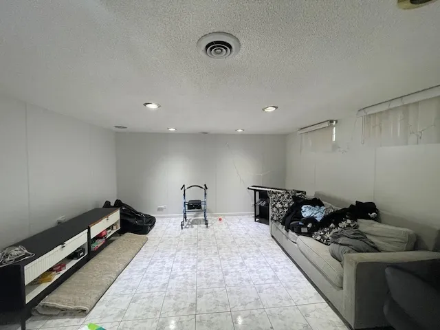 a bed room with furniture and a couch