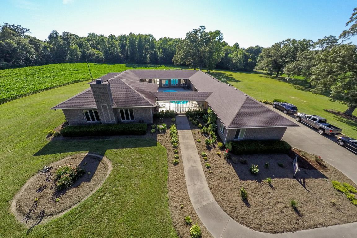 951 York Road Clarksville, TN 37042 - Photo 1 of 29 Aerial shot of the front entry. Notice how the pool is welcoming. The views throughout the home are breathtaking.