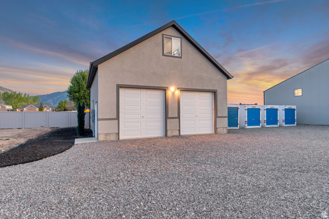 1526 South 500 West Mapleton, UT 84664 - Photo 38 of 54 Garage at dusk featuring a garage