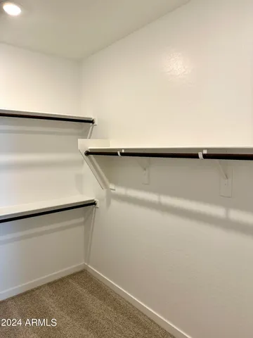 a view of small space with racks on the wall