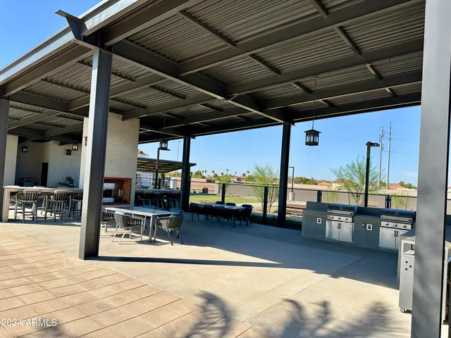 a view of a swimming pool with a porch