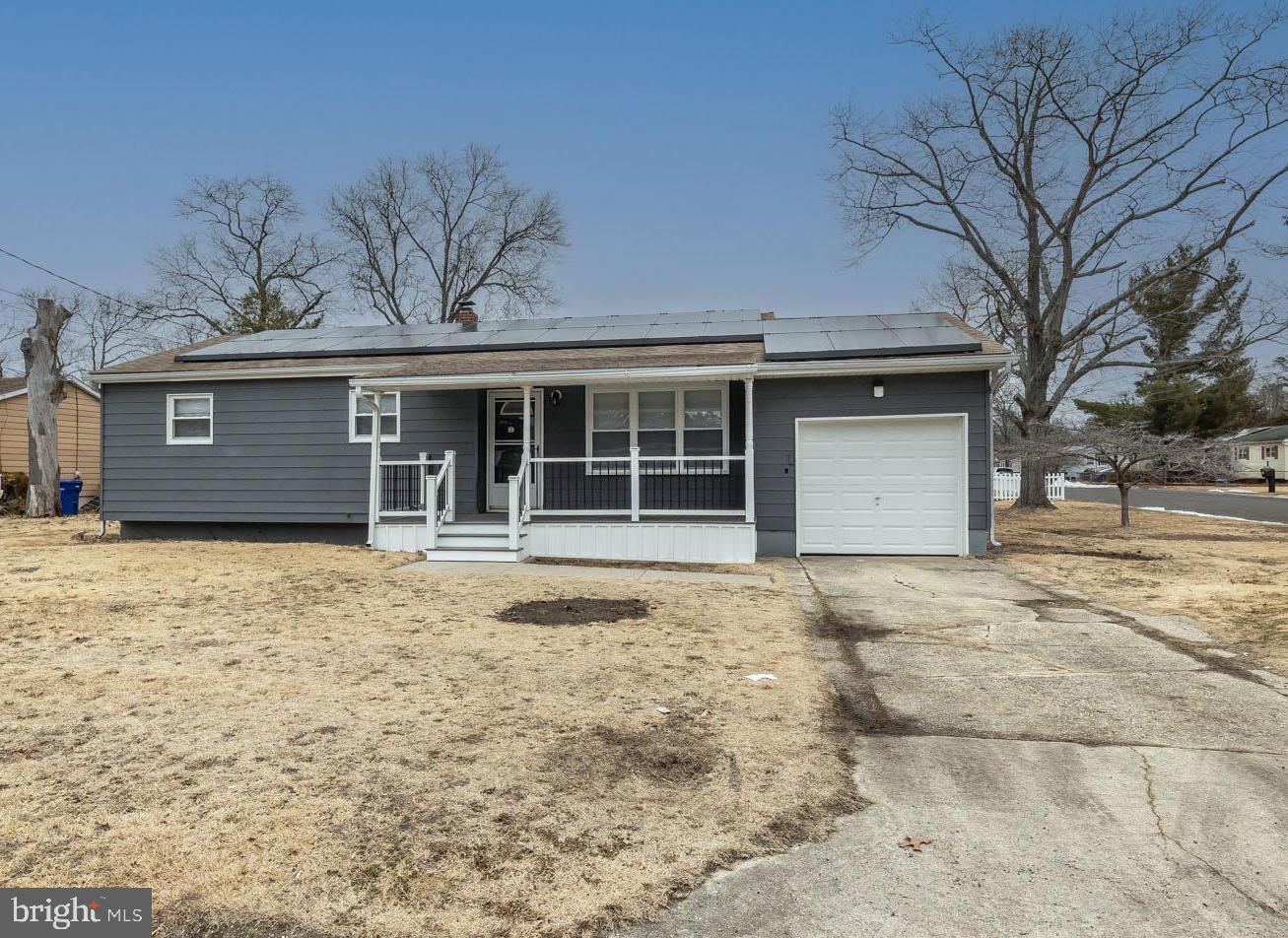 a house view with a garden space