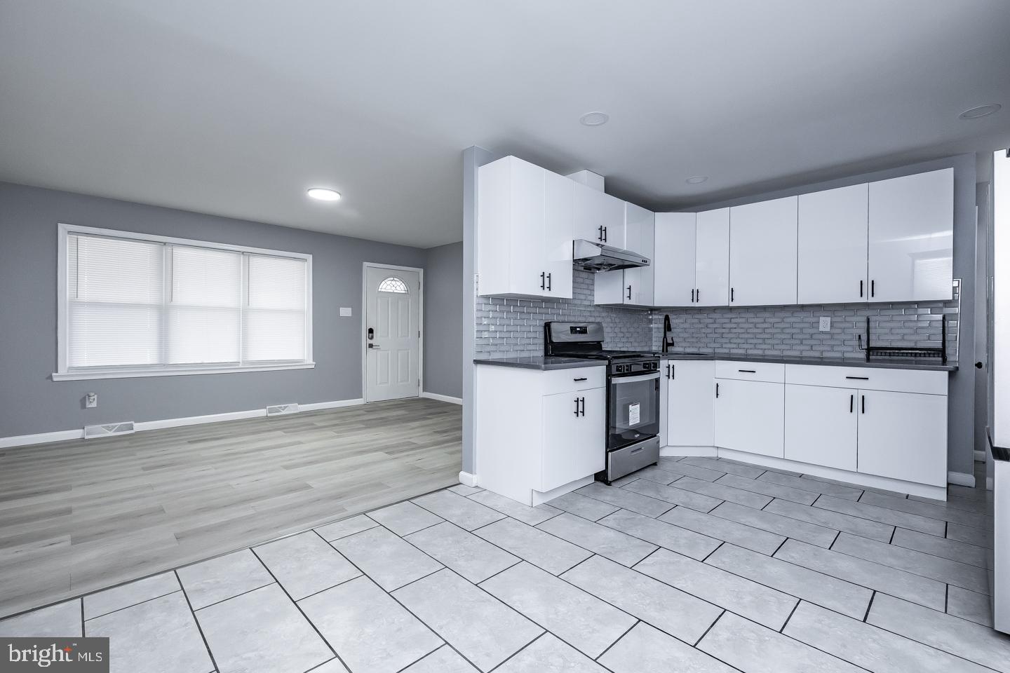 2 Cardinal Road Millville, NJ 08332 - Photo 11 of 39 a kitchen with a stove a sink and a refrigerator