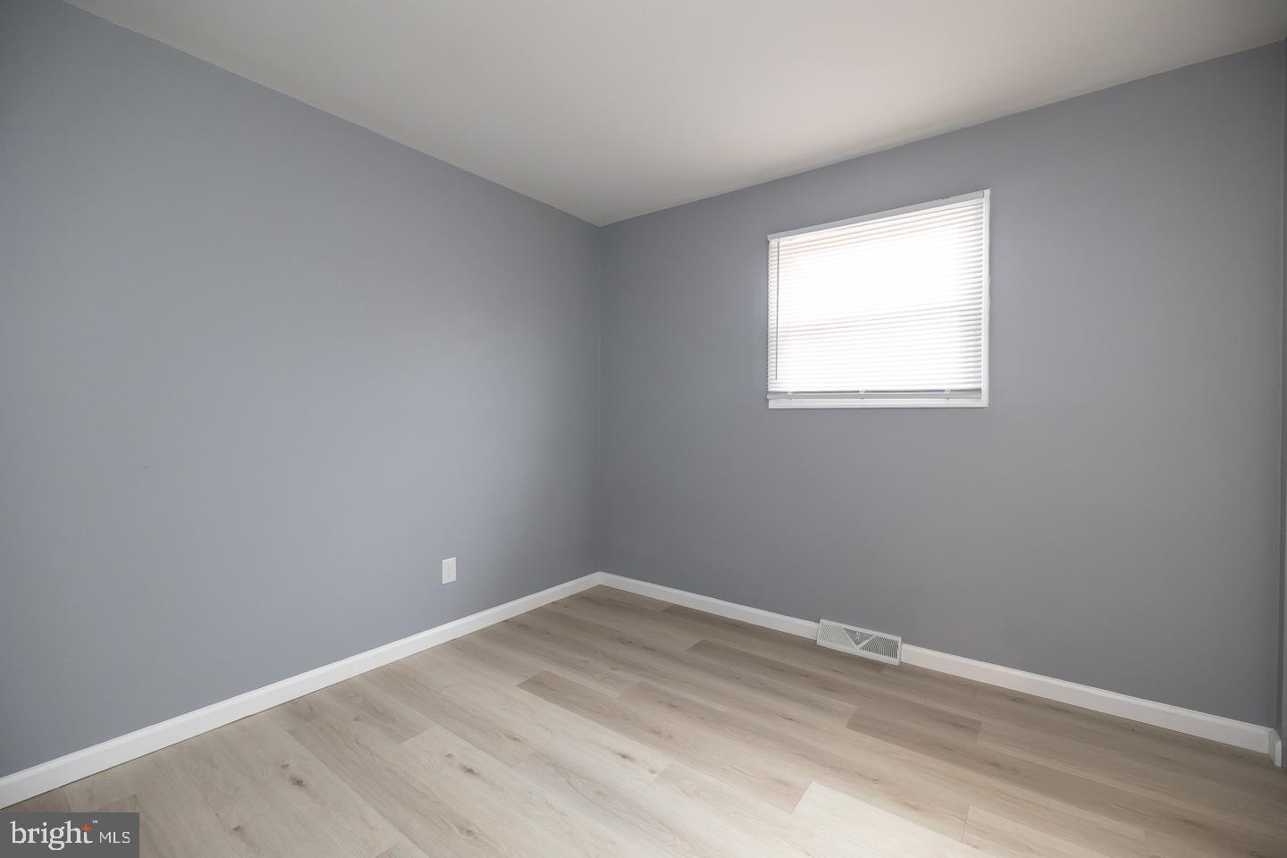 2 Cardinal Road Millville, NJ 08332 - Photo 15 of 39 wooden floor in an empty room with a window