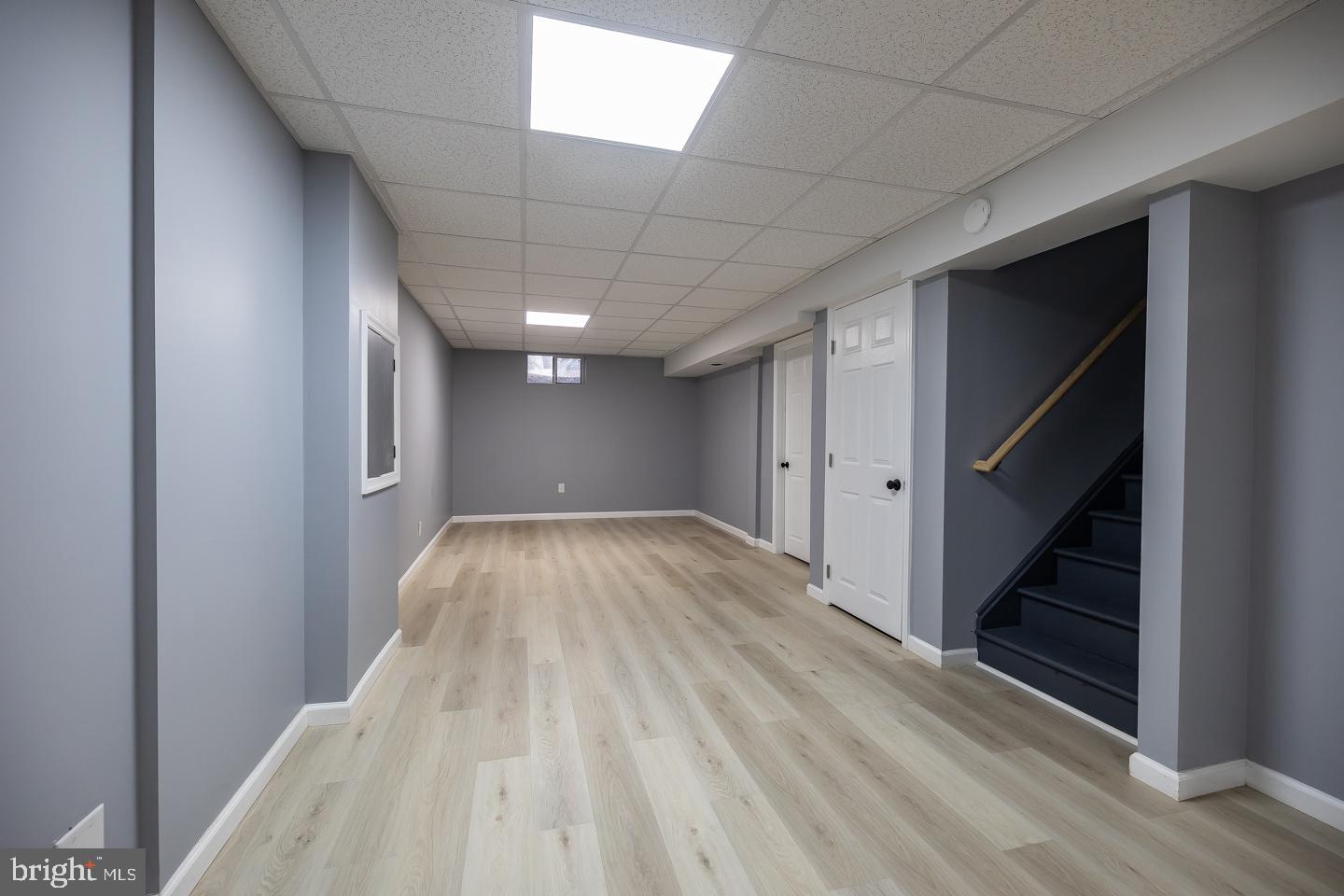 2 Cardinal Road Millville, NJ 08332 - Photo 30 of 39 a view of hallway with stairs and wooden floor