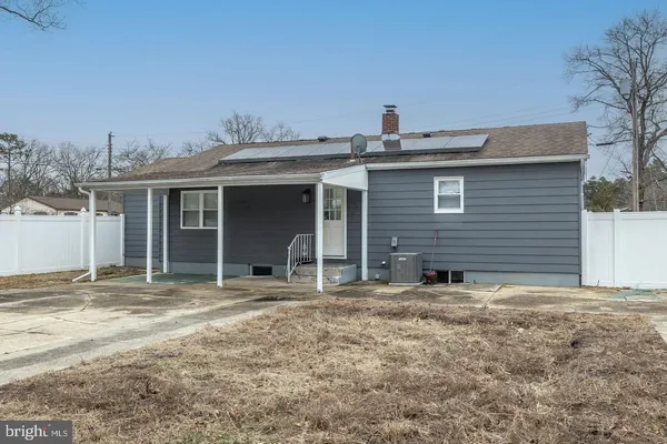 a house with yard in front of it