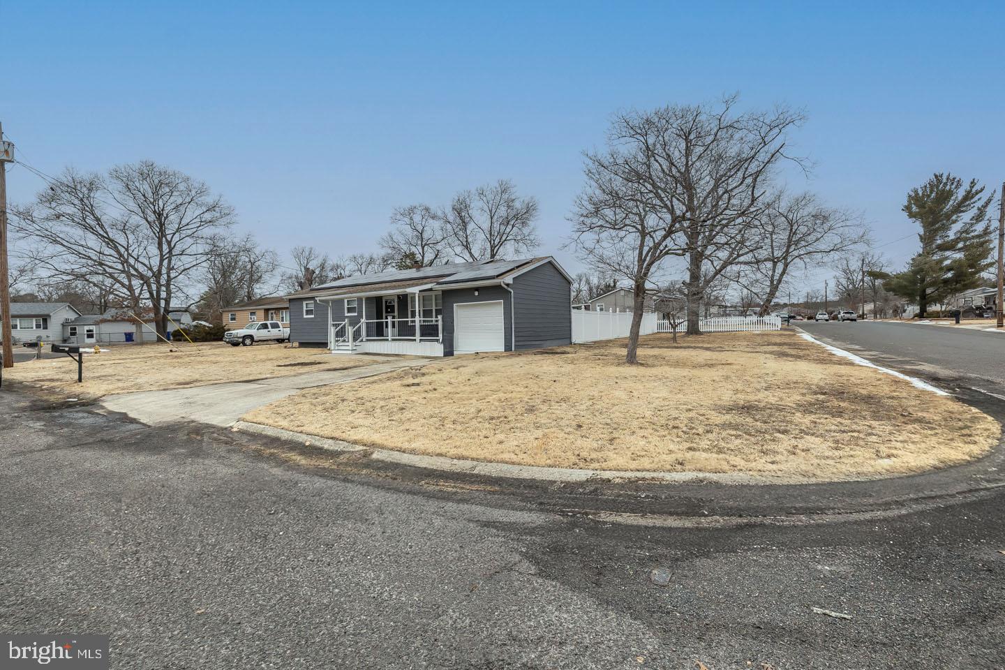 2 Cardinal Road Millville, NJ 08332 - Photo 4 of 39 a view of house with snow on the road
