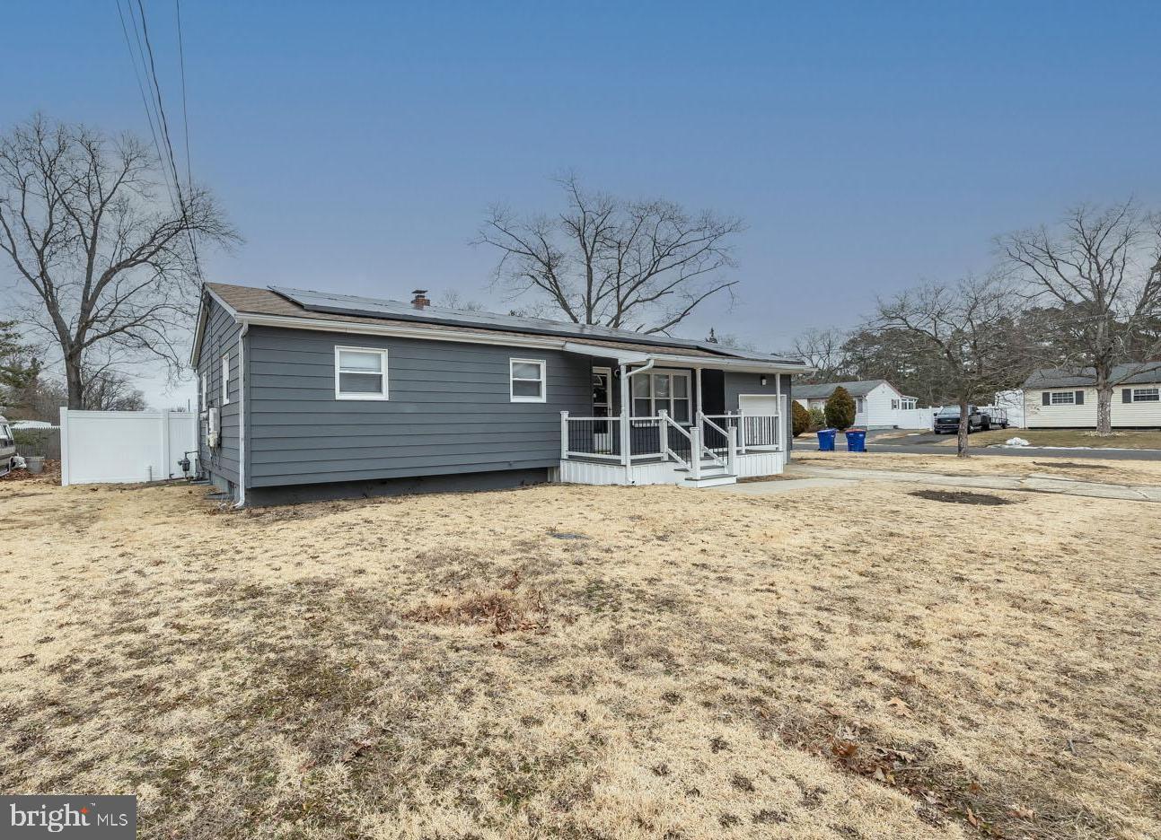 2 Cardinal Road Millville, NJ 08332 - Photo 6 of 39 a front view of a house with a yard