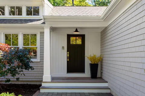 a view of a entryway door front of house