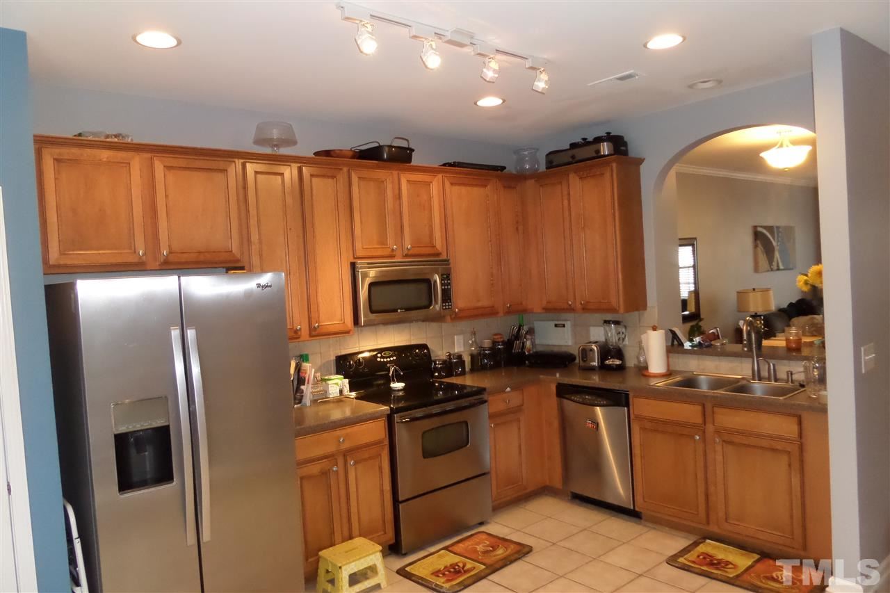 7872 Spungold Street Raleigh, NC 27617 - Photo 6 of 16 Control of Intercom with Radio system from the kitchen