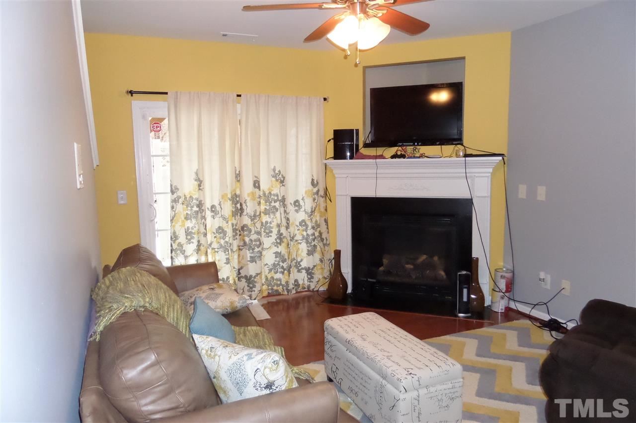 7872 Spungold Street Raleigh, NC 27617 - Photo 9 of 16 Enjoy your full basement with a cozy fireplace.