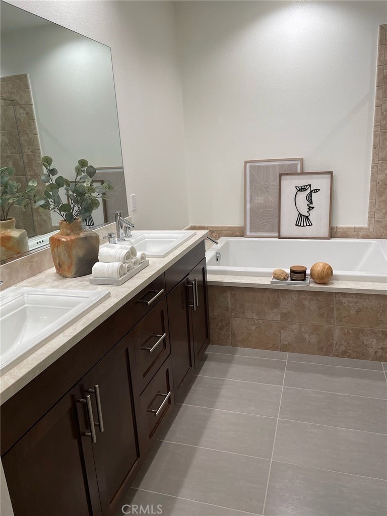 37 Soho Irvine, CA 92612 - Photo 14 of 21 a spacious bathroom with a tub sink and mirror