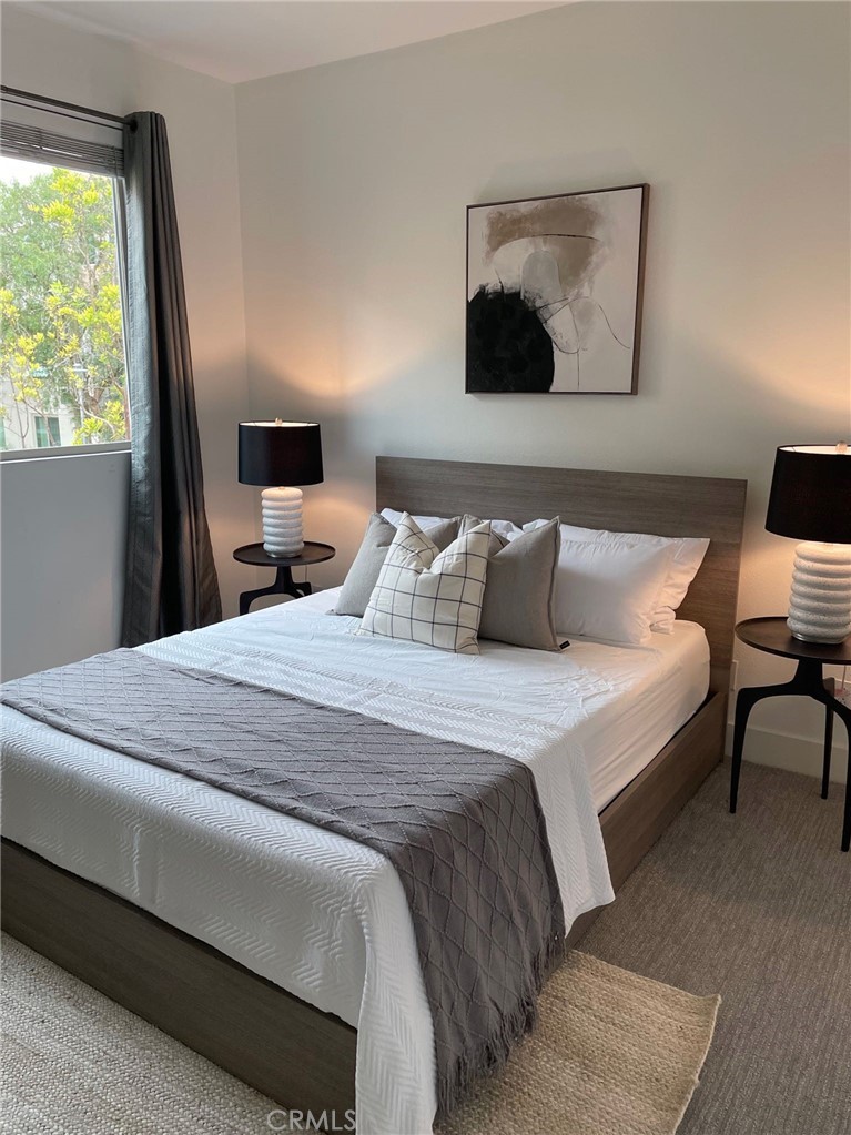 37 Soho Irvine, CA 92612 - Photo 19 of 21 a bedroom with a bed and window