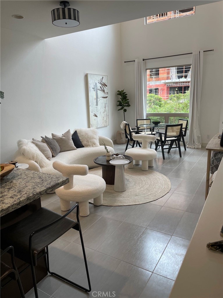 37 Soho Irvine, CA 92612 - Photo 4 of 21 a living room with furniture and window
