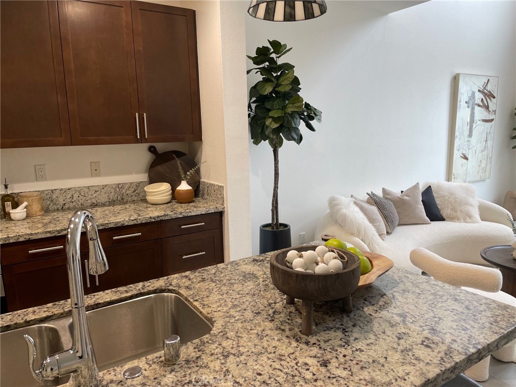 37 Soho Irvine, CA 92612 - Photo 6 of 21 a kitchen with a sink and a stove