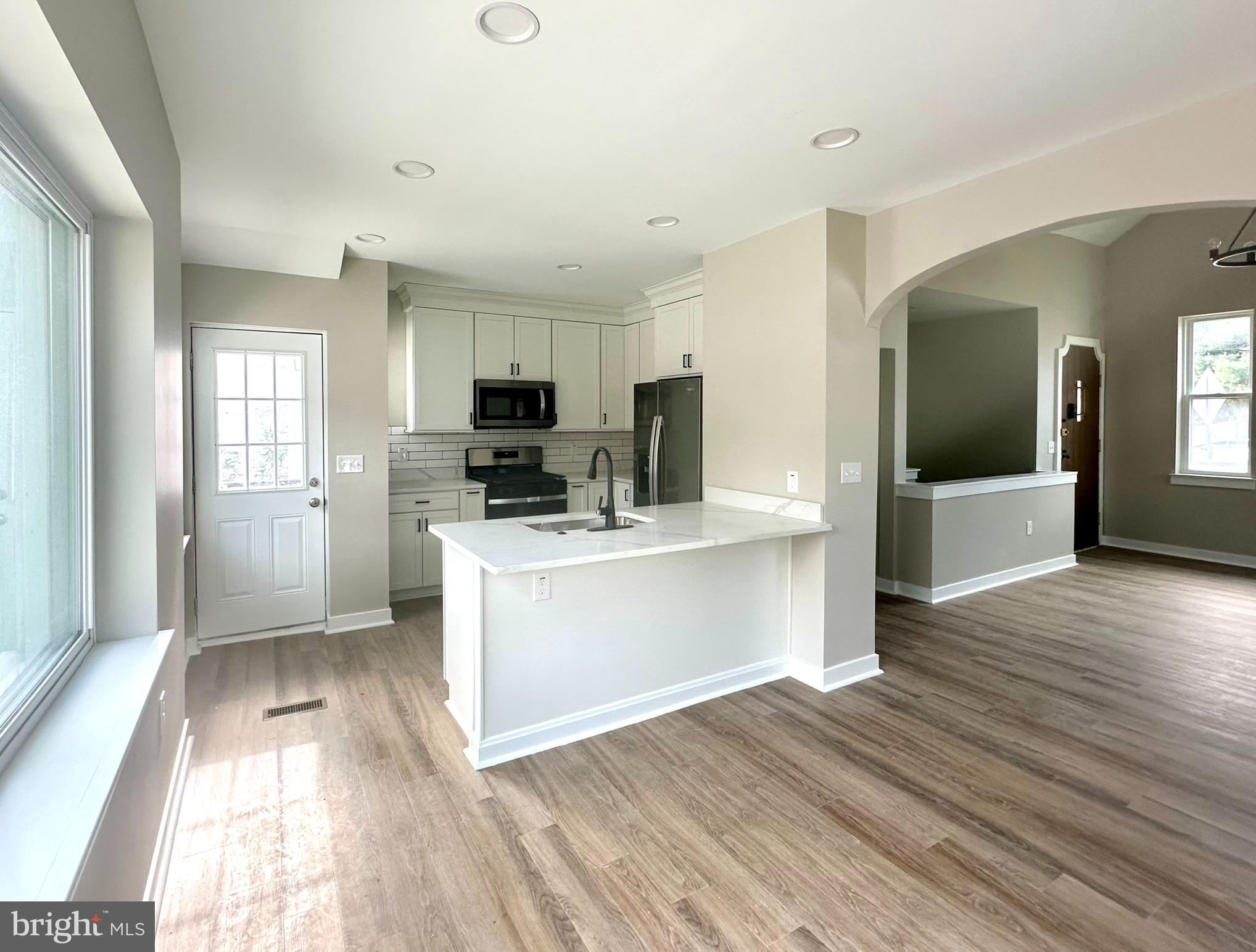 9305 Colesville Road Silver Spring, MD 20901 - Photo 12 of 39 Seating At The Breakfast Bar