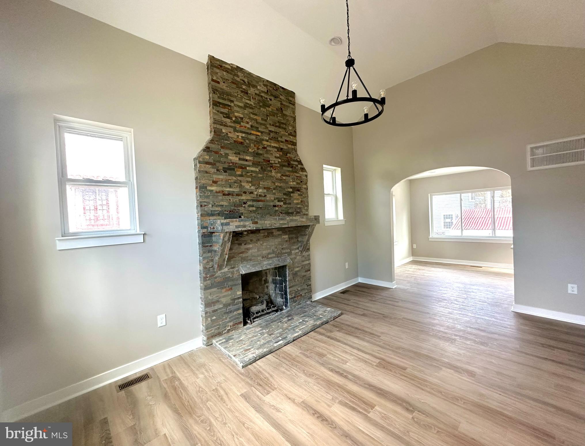 9305 Colesville Road Silver Spring, MD 20901 - Photo 18 of 39 Stacked Stone Faux Fireplace