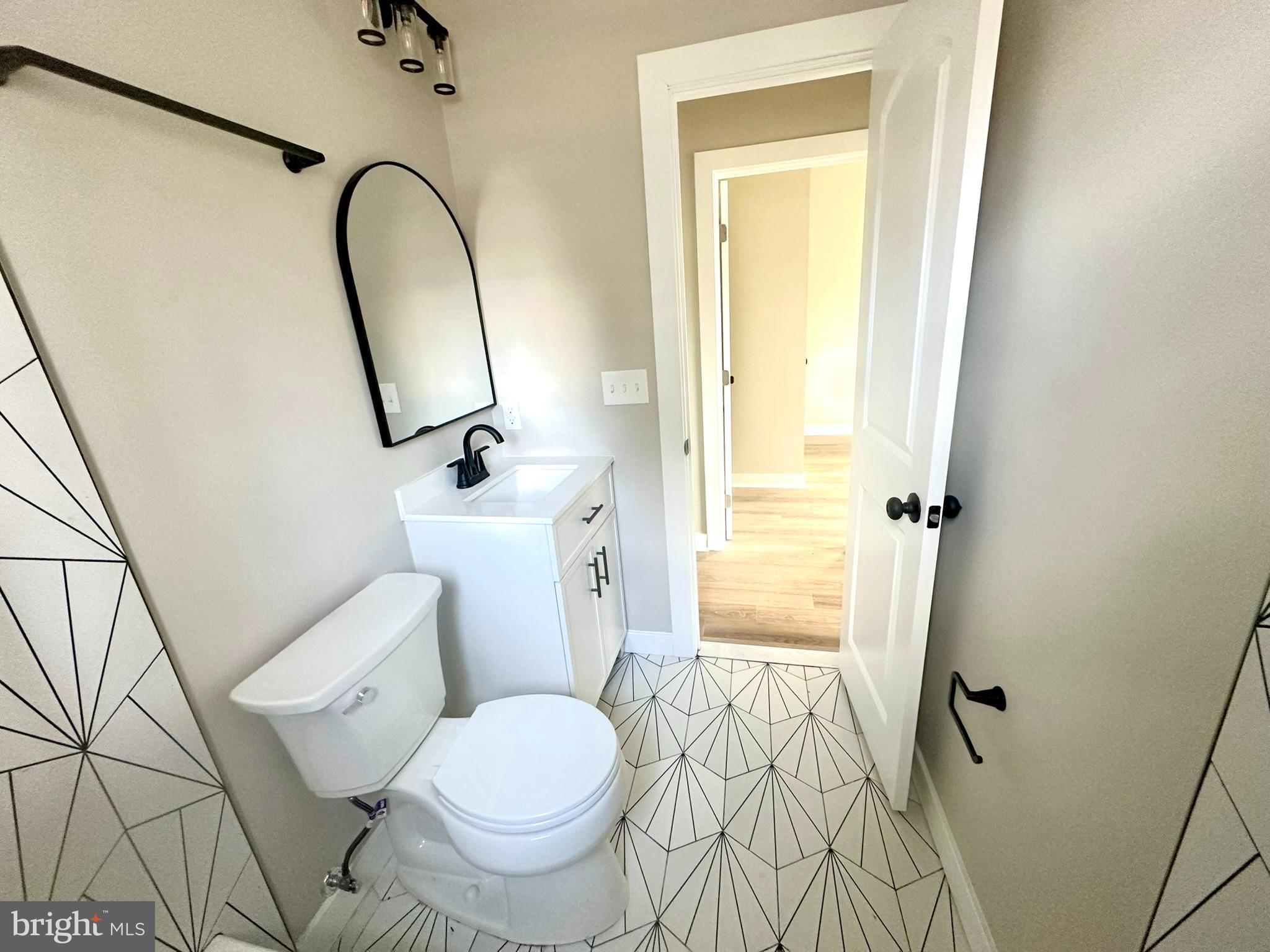 9305 Colesville Road Silver Spring, MD 20901 - Photo 24 of 39 Hall Bathroom