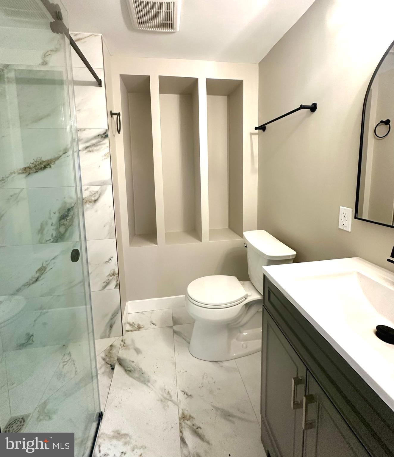 9305 Colesville Road Silver Spring, MD 20901 - Photo 31 of 39 Second Full Bathroom (Shelves Installed)