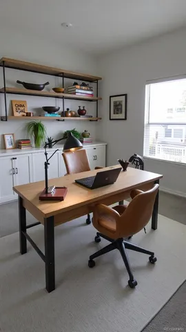 a room with furniture pool table and windows