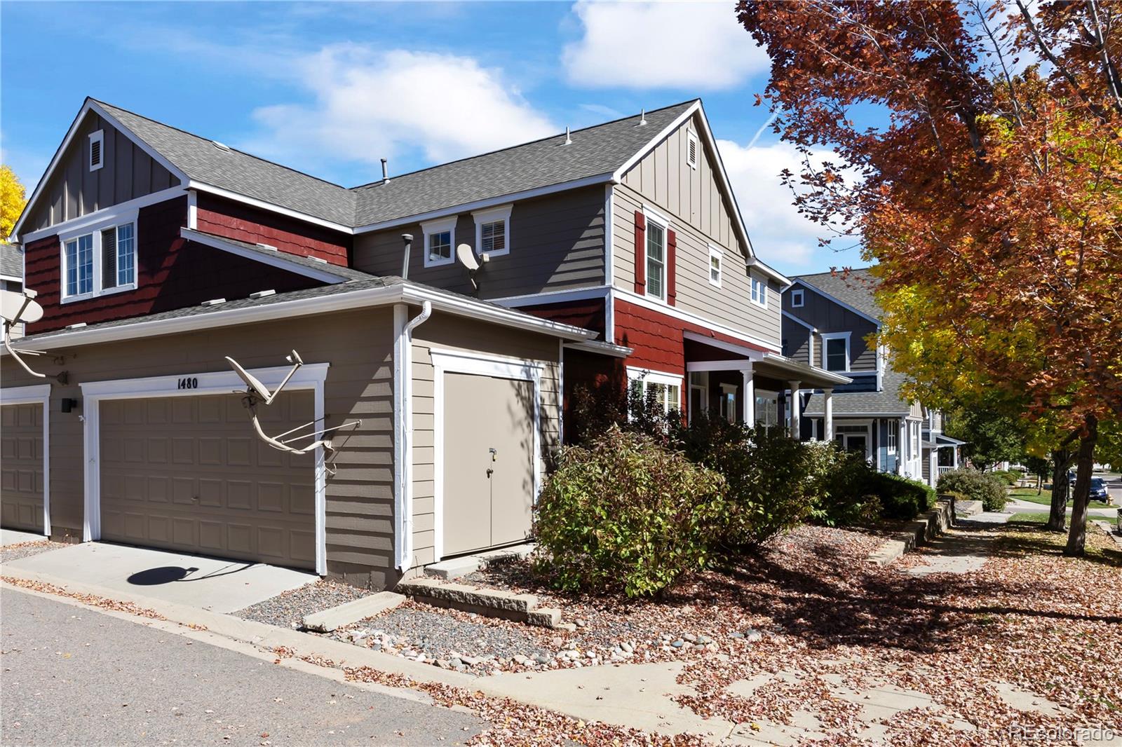 1480 Thunder Butte Road Castle Rock, CO 80109 - Photo 2 of 35 a front view of a house with a yard