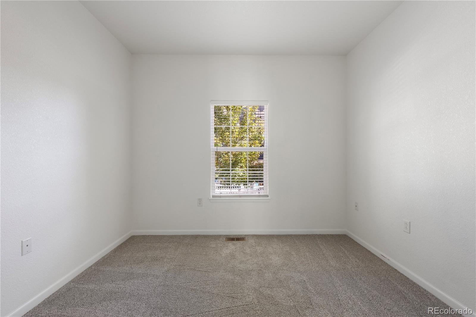 1480 Thunder Butte Road Castle Rock, CO 80109 - Photo 25 of 35 an empty room with a window