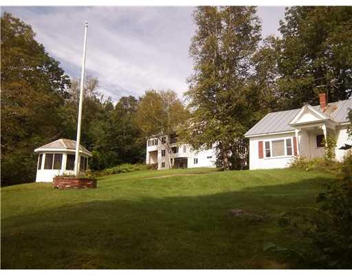 148 Wheeler Hill Road Phillips, ME 04966 - Photo 21 of 23 Exterior Front. Cape on the right,...