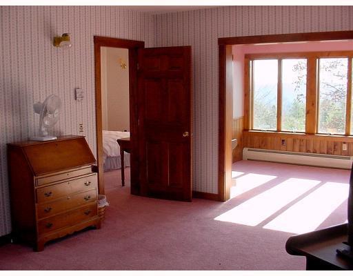 148 Wheeler Hill Road Phillips, ME 04966 - Photo 8 of 23 Bedroom. a three room bedroom suite...