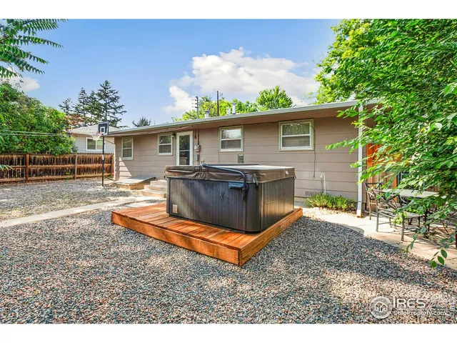 a view of a backyard with a patio