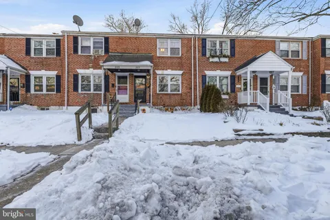 a view of a terrace with sitting area