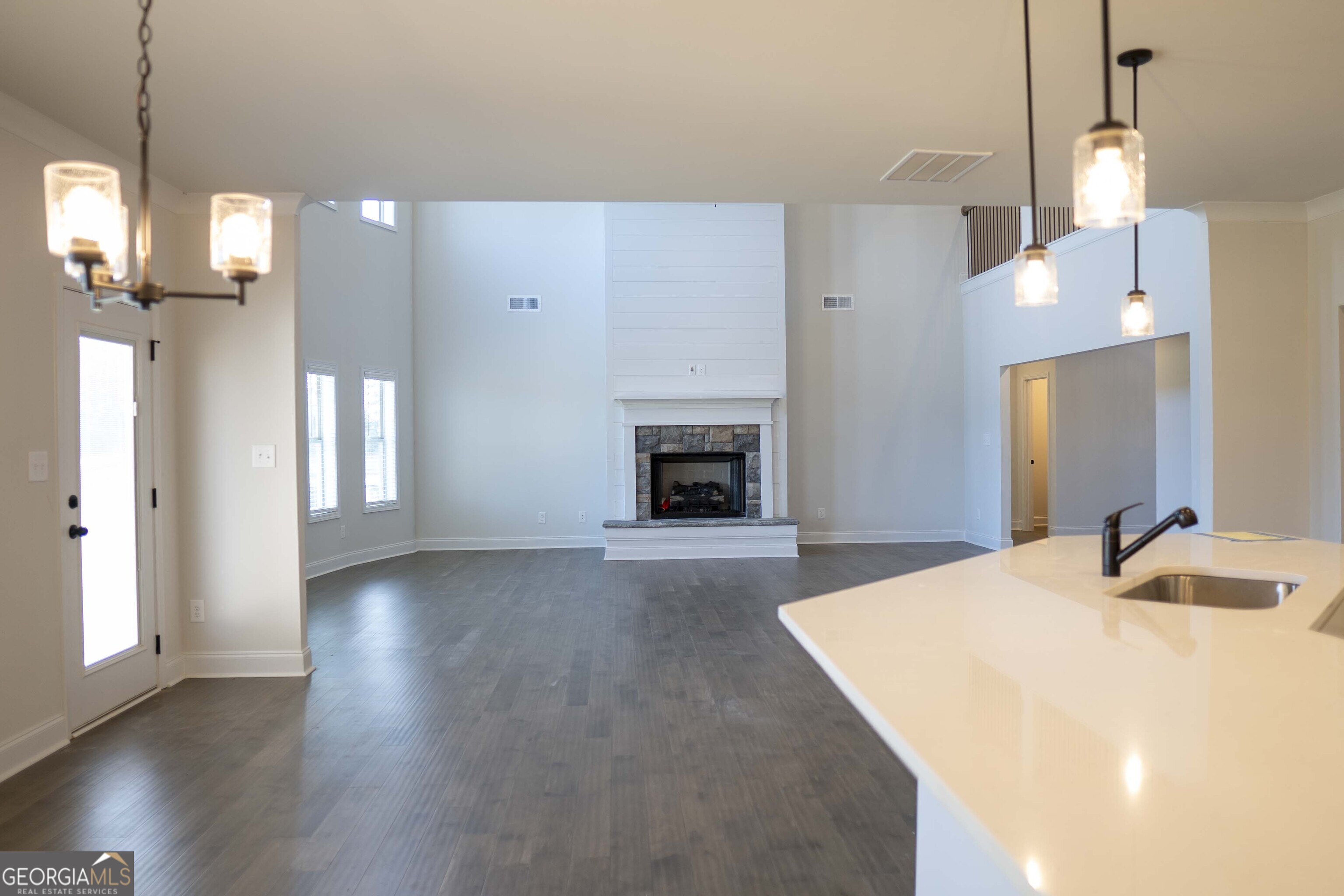 600 Beaver Court Perry, GA 31069 - Photo 20 of 48 a room with a bed and a fireplace