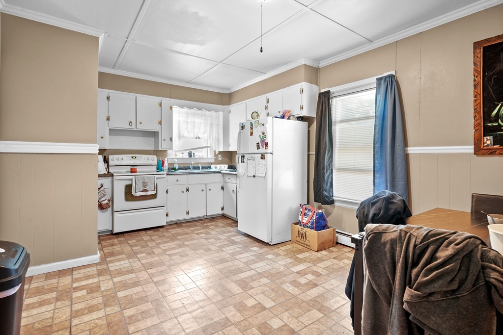 283 Fall River Avenue Seekonk, MA 02771 - Photo 2 of 32 a kitchen with stainless steel appliances a refrigerator sink and cabinets