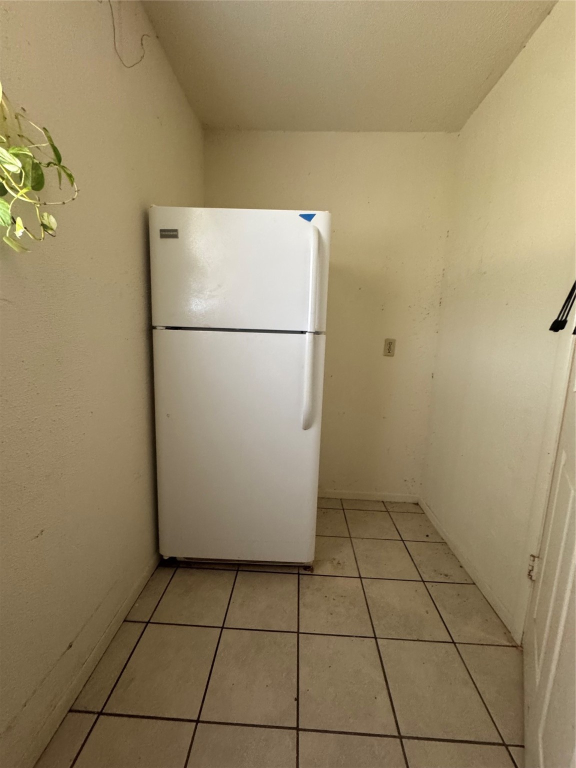 6674 Fm 3060 Midway, TX 75852 - Photo 14 of 44 a white refrigerator freezer and a stove sitting inside of a kitchen