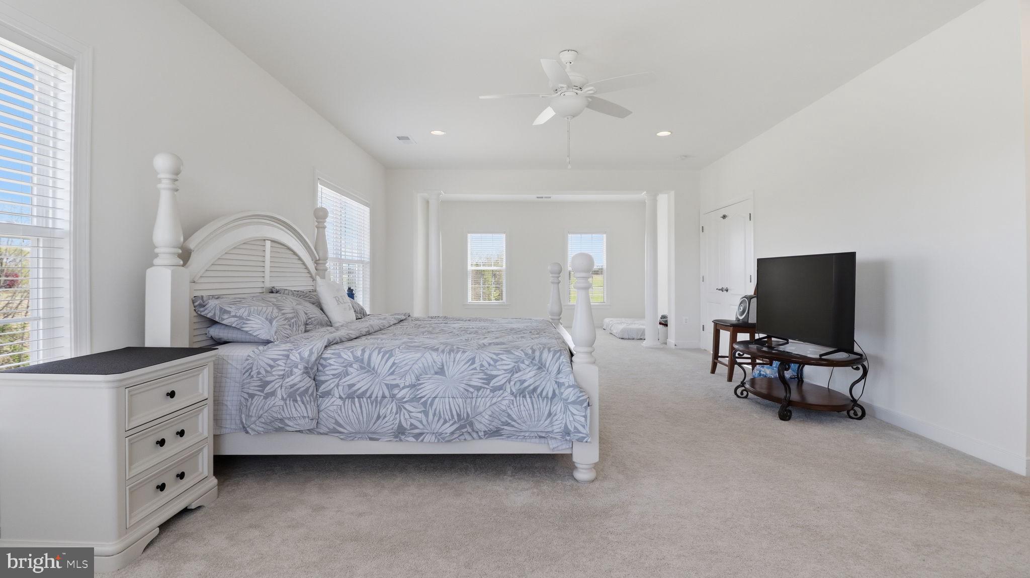 11502 Aden Road Nokesville, VA 20181 - Photo 80 of 106 a living room with furniture and a flat screen tv