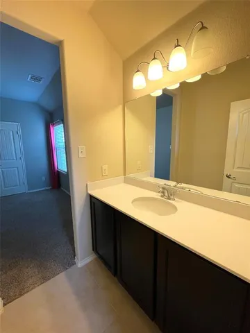 a house view with a garden space