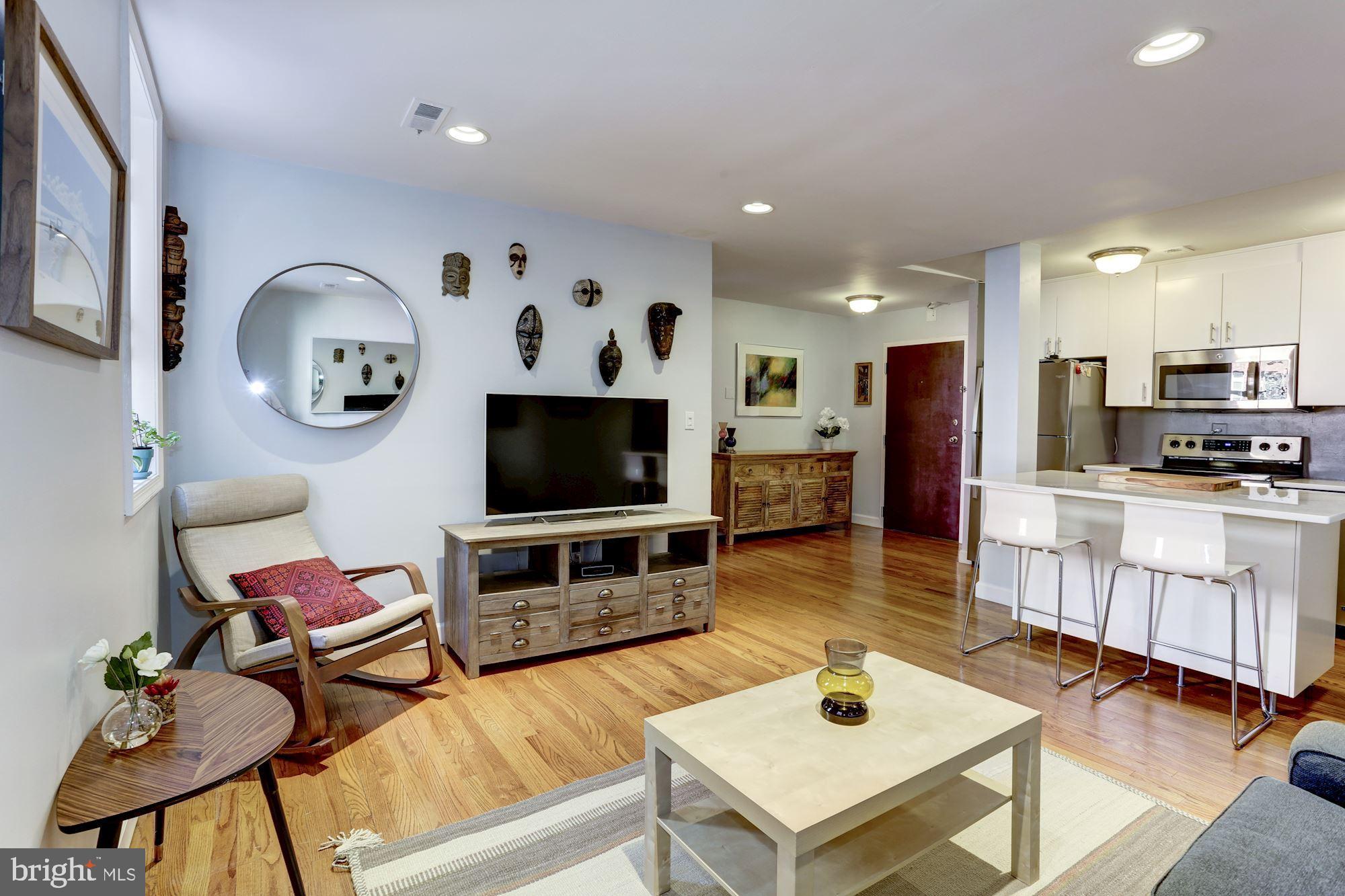 Living room with view of entryway