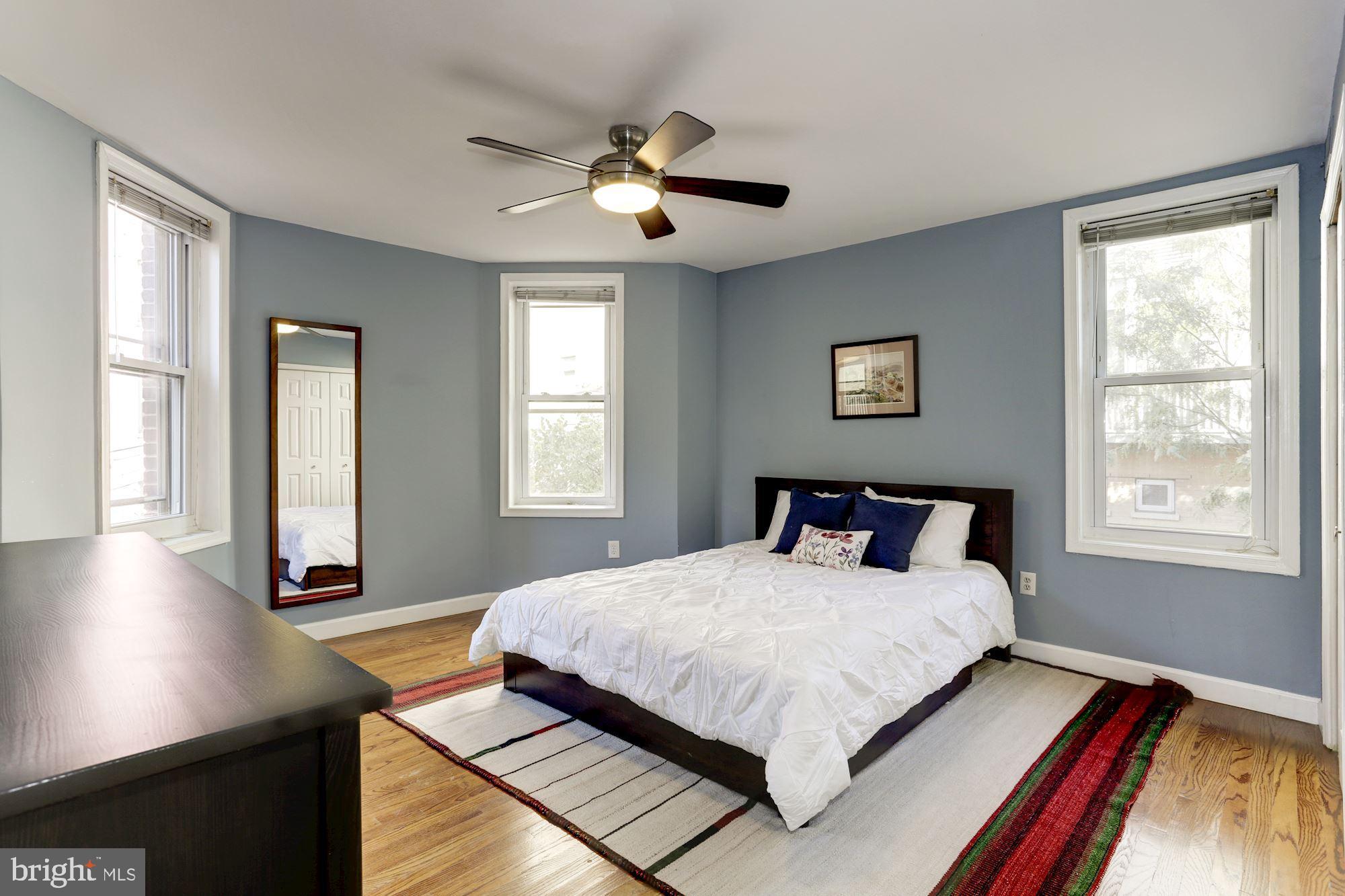 1421 Columbia Road Northwest, Unit 203 Washington, DC 20009 - Photo 10 of 18 Master bedroom with bay window